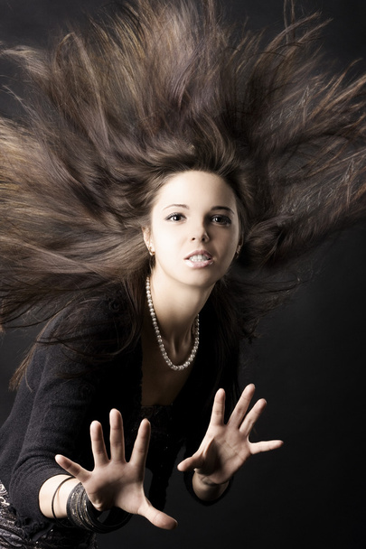 Beautiful young woman with luxurious hair - Zdjęcie, obraz