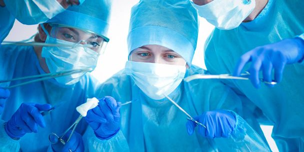 Young surgery team in the operating room - Foto, Imagem