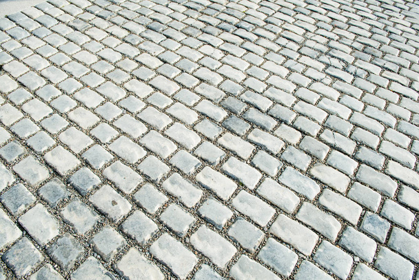 Straße gepflastert mit Pflastersteinen für den Hintergrund - Foto, Bild