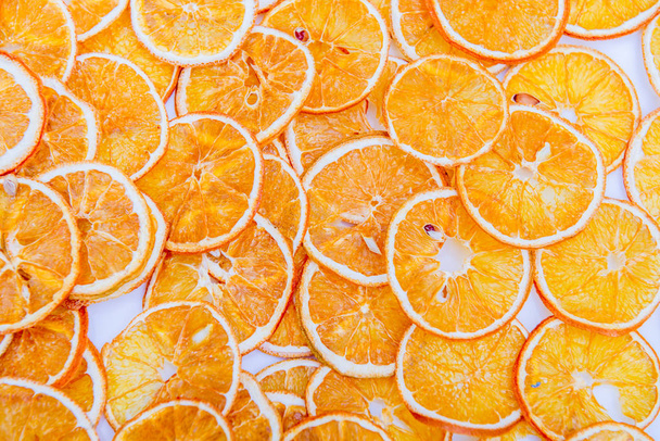 Pattern arranged with dried orange slices - Photo, Image