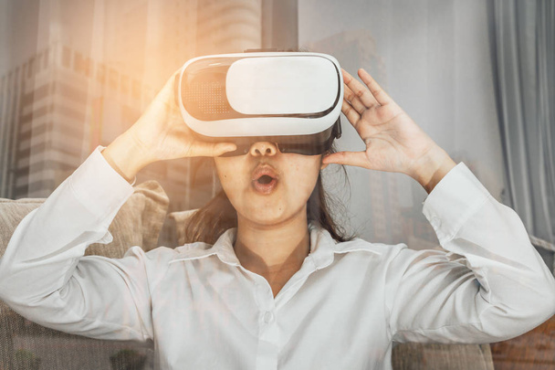 Double exposure , Asia woman using virtual reality glasses expre - Zdjęcie, obraz