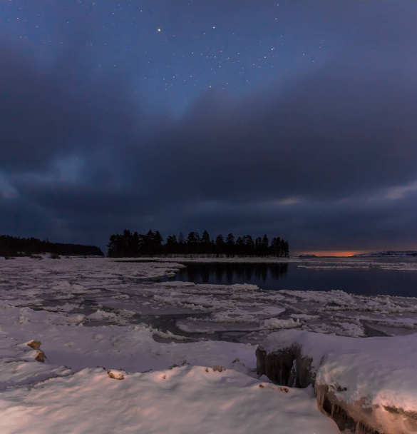 Winter frosty evening on lake Ladoga. Karelia. Russia - Zdjęcie, obraz