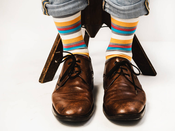 Men's legs in bright socks - Фото, изображение