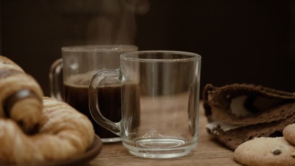 Pouring coffee into cup .  Steam from a cups with a hot coffee .  Breakfast. - Imágenes, Vídeo