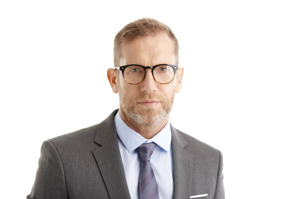 Portrait of executive middle aged businessman wearing suit and eyeglasses while standing against at isolated white background. - Foto, Imagem