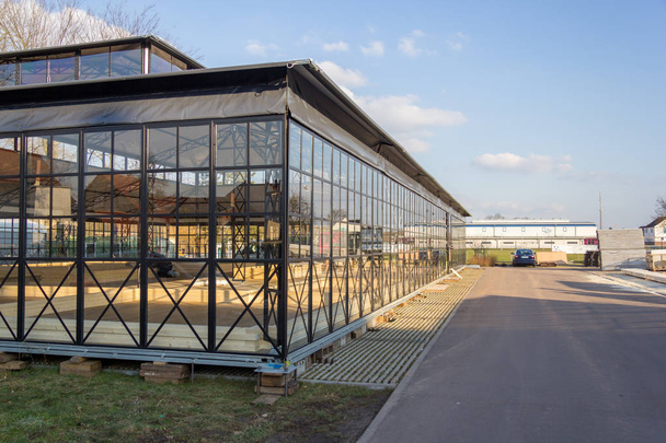 a glasshouse building near a garden from the horticultural show - Photo, Image