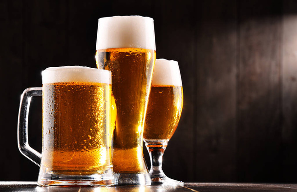 Composition with three glasses of lager beer - Φωτογραφία, εικόνα