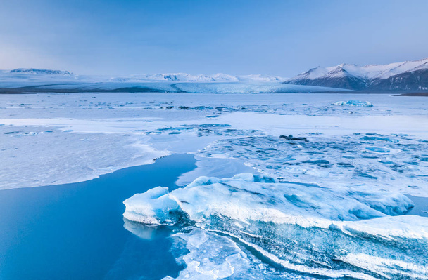 Vatnajokull lagoon  iceburg with moutains and glacier in backgro - Photo, Image