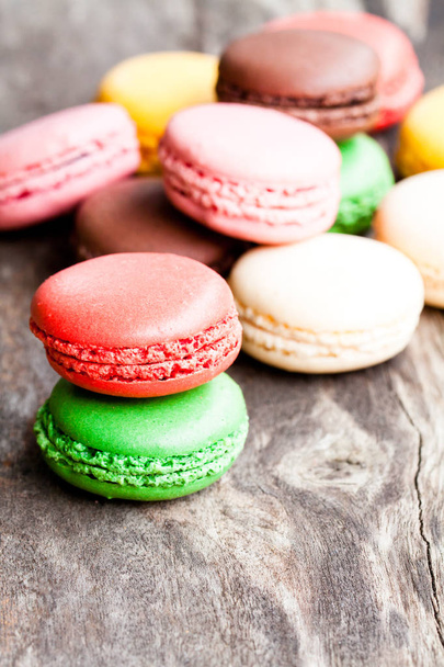 colorful  macarons on rustic wooden backrgound  - Foto, immagini