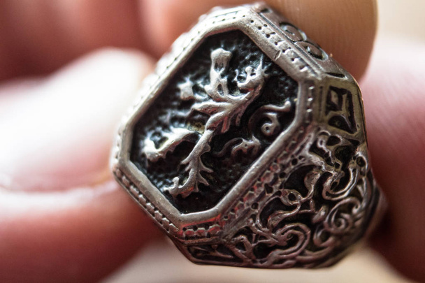 man ring with a lion coat of arms - Photo, Image