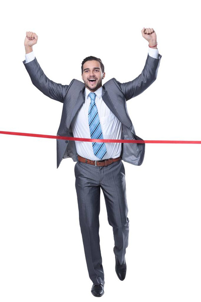 triumphant businessman in front of the starting tape - Фото, изображение