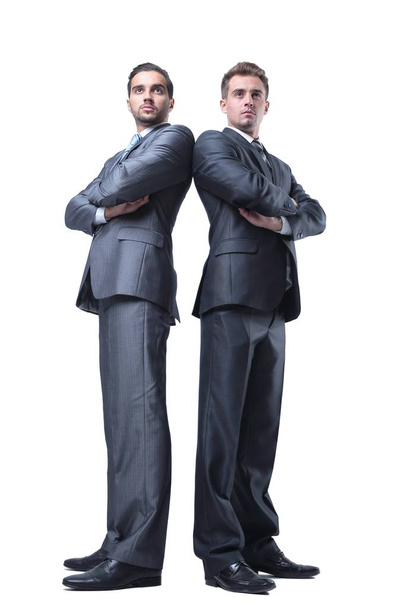 two business partners standing back to back - Fotó, kép