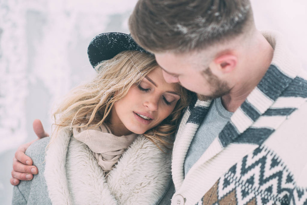 Photo of happy man and woman outdoor in winter - Φωτογραφία, εικόνα