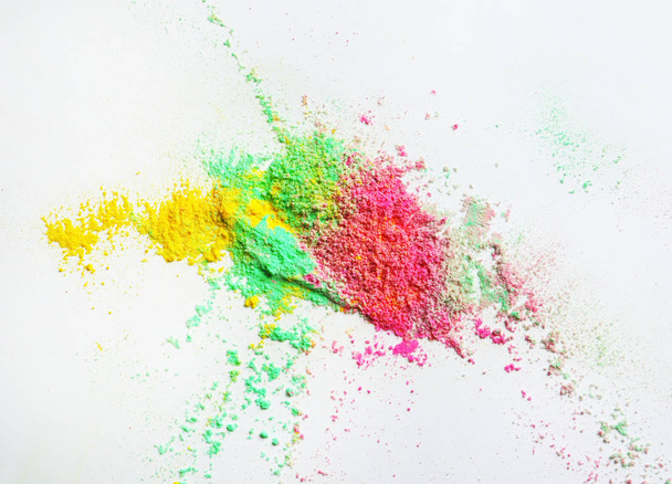 Colorful powders for Holi festival on white background - Valokuva, kuva