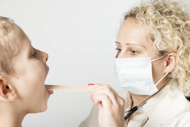 Doctor with mouth protection - Photo, Image