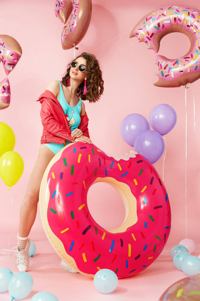 Summer Fashion. Woman In Swimsuit With Balloons - 写真・画像
