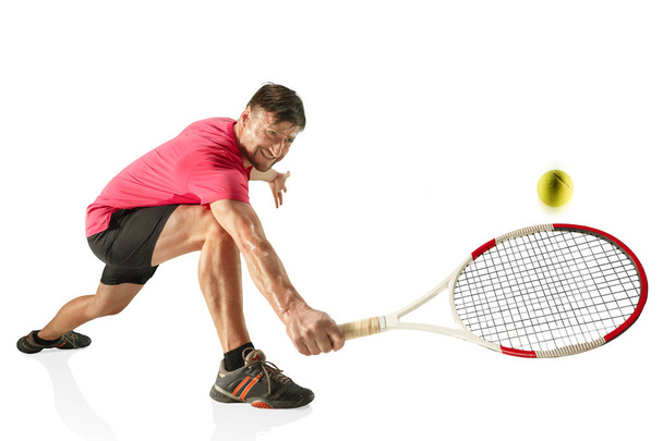 one caucasian man playing tennis player isolated on white background - Foto, Bild