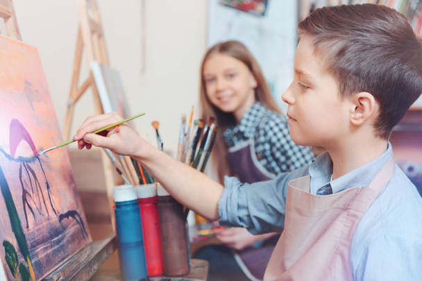 Cheerful kids painting together - Φωτογραφία, εικόνα