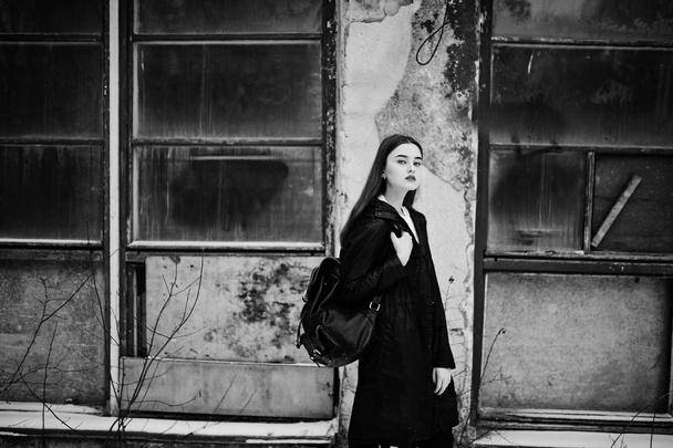 Fashionable long legs brunette model in long black cloak posed o - Fotografie, Obrázek