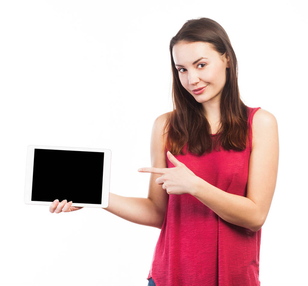 Brunette presenting a digital tablet - Zdjęcie, obraz