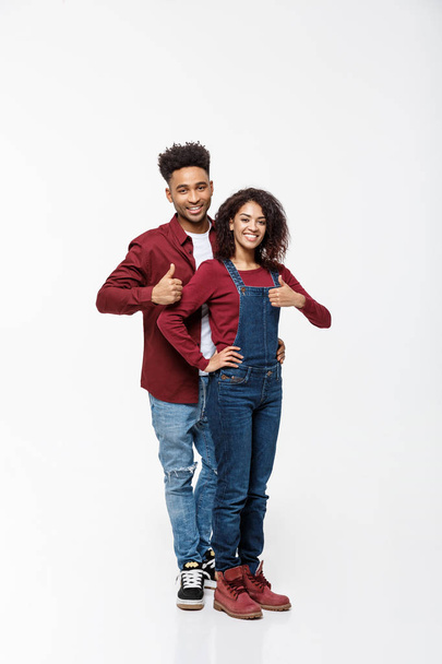 Lovely African American couple gesturing thumbs up to camera. - Fotoğraf, Görsel