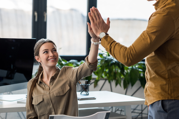 business partners giving high five at office - Photo, Image
