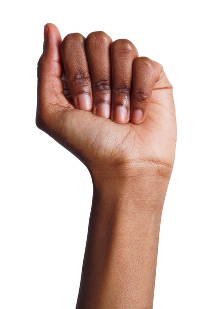 Puño negro femenino aislado sobre fondo blanco
 - Foto, imagen