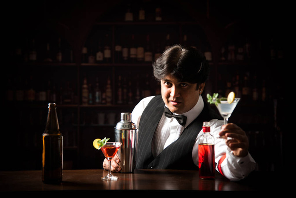 Asian Indian waiter or Bartender isolated over white background, selective focus - Photo, Image