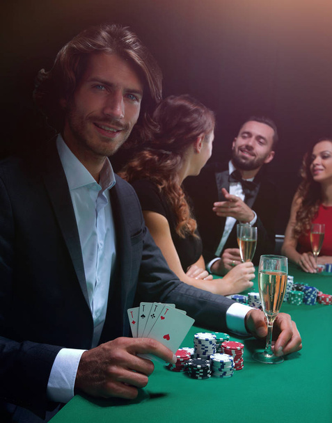 group of sinister poker players - 写真・画像