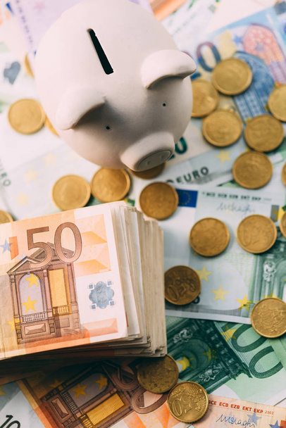 Piggy moneybox with euro cash - Fotó, kép
