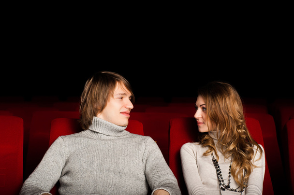 Young couple in the cinema - Foto, afbeelding