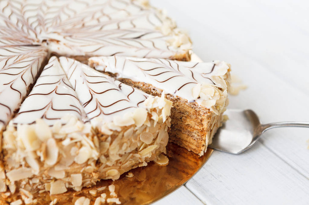 Esterhazy cake sliced on white plate closeup - Fotoğraf, Görsel