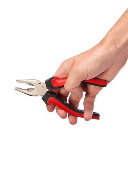 Male hand hold a black and red pliers - Fotografie, Obrázek
