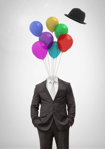 Digital composite of Headless man with surreal floating hat and balloons in front of sky - Фото, изображение