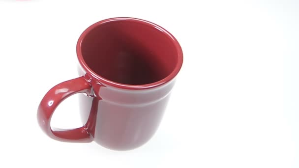 Punainen kahvi kuppi tuoretta kahvia
  - Materiaali, video