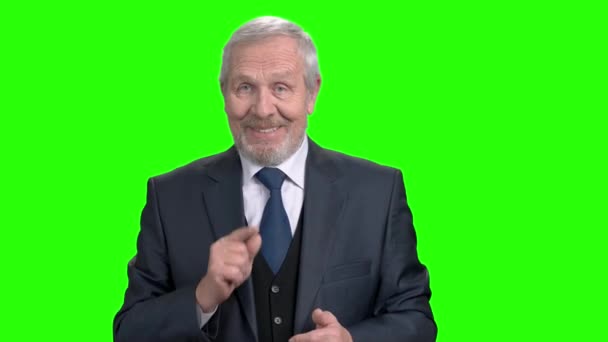 Elderly bearded businessman talking on green screen. - Footage, Video