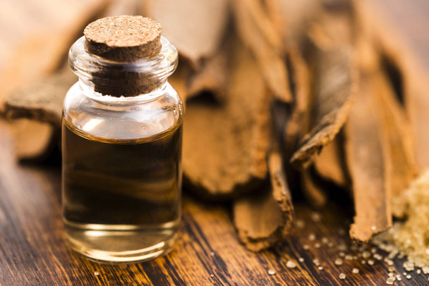 Cinnamon essential oil - Photo, Image