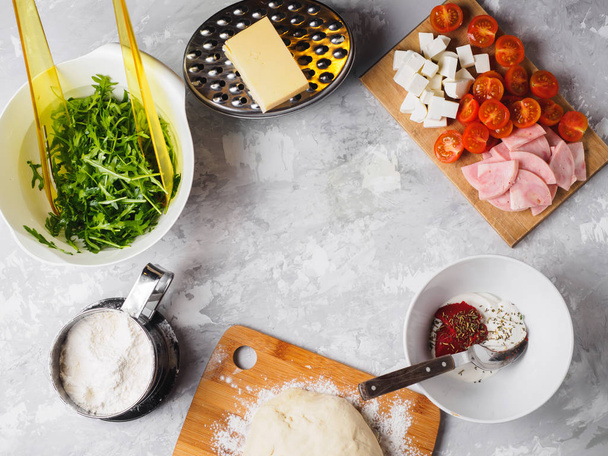 pizza ingredients. cherry ham sauce greens dough cheese flour - Foto, immagini