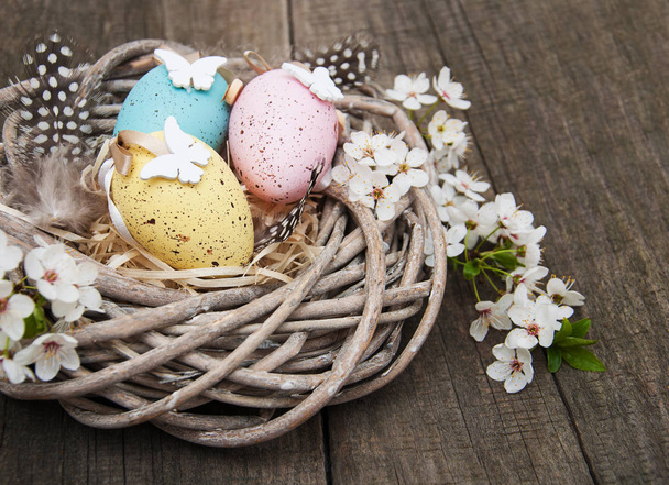 Easter eggs and spring  blossom - Photo, image