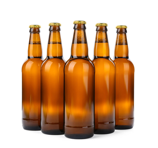 Glass bottles of beer isolated on white - Photo, image