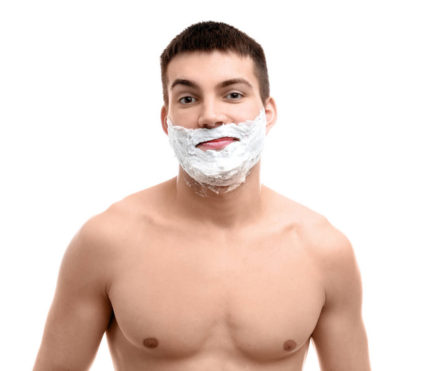young man with shaving foam - Zdjęcie, obraz