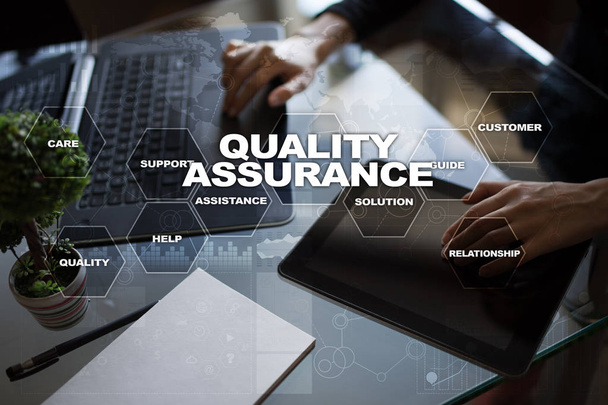 Quality assurance concept on the virtual screen. Business concept. - Photo, image