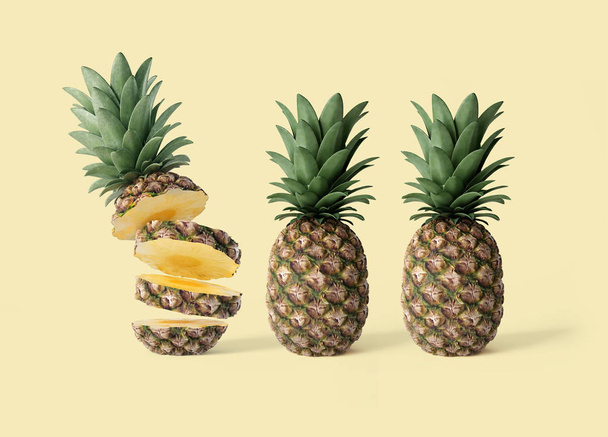 Jedna plátky a dva celé ananasy na žlutém podkladu - Fotografie, Obrázek