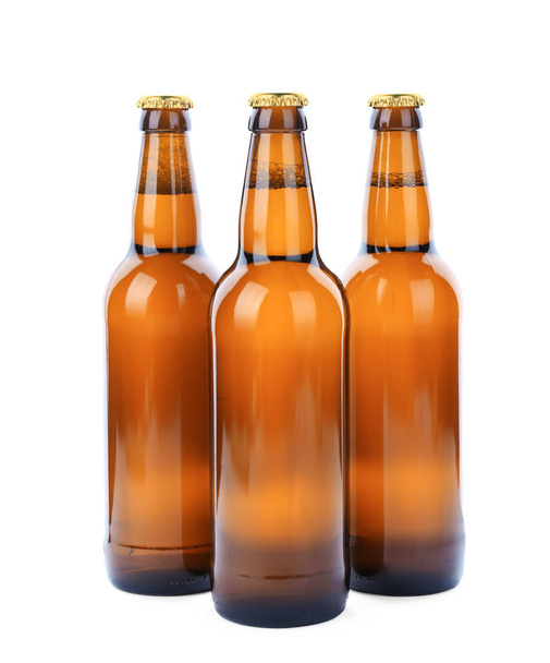 Glass bottles of beer isolated on white - Photo, Image