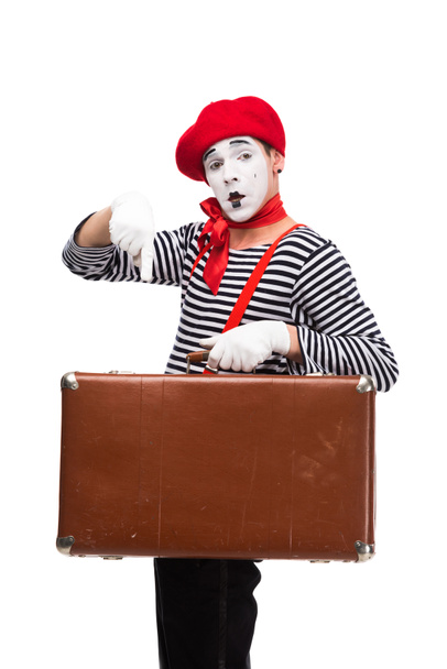 mime pointing on brown suitcase isolated on white - Foto, Imagen