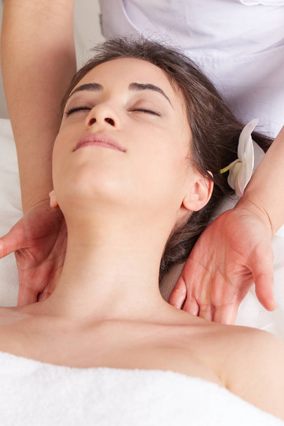 Female Enjoying Relaxing face Massage In Cosmetology Spa Center - Φωτογραφία, εικόνα