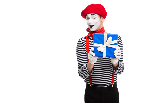 excited mime holding gift box isolated on white - Photo, Image