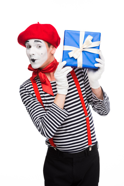 cheerful mime holding gift box isolated on white - Photo, Image