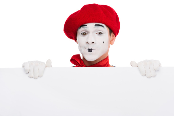 happy mime holding blank placard isolated on white - Fotó, kép