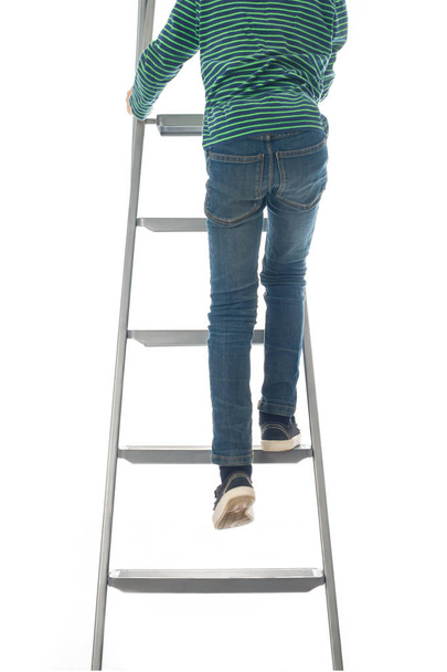 the boy climbs on a ladder to the purpose up - Photo, Image